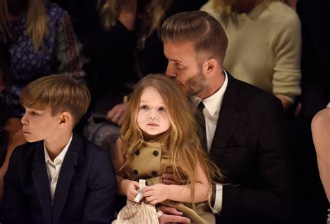 Harper Beckham, Victoria Beckham, David Beckham at Burberry 